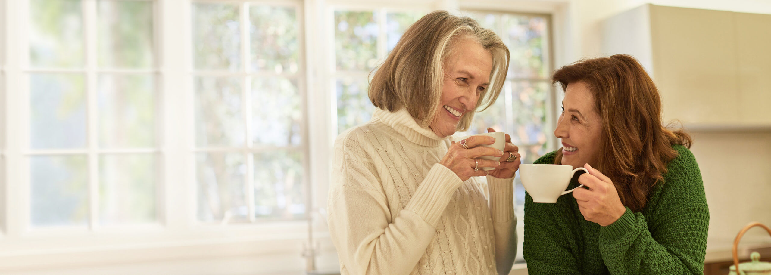 Two seniors enjoying a cup of tea